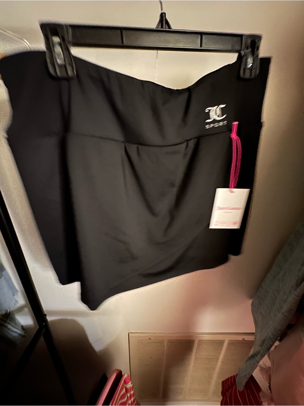Juicy Couture Black Mini Skirt with Pink Tag Accent